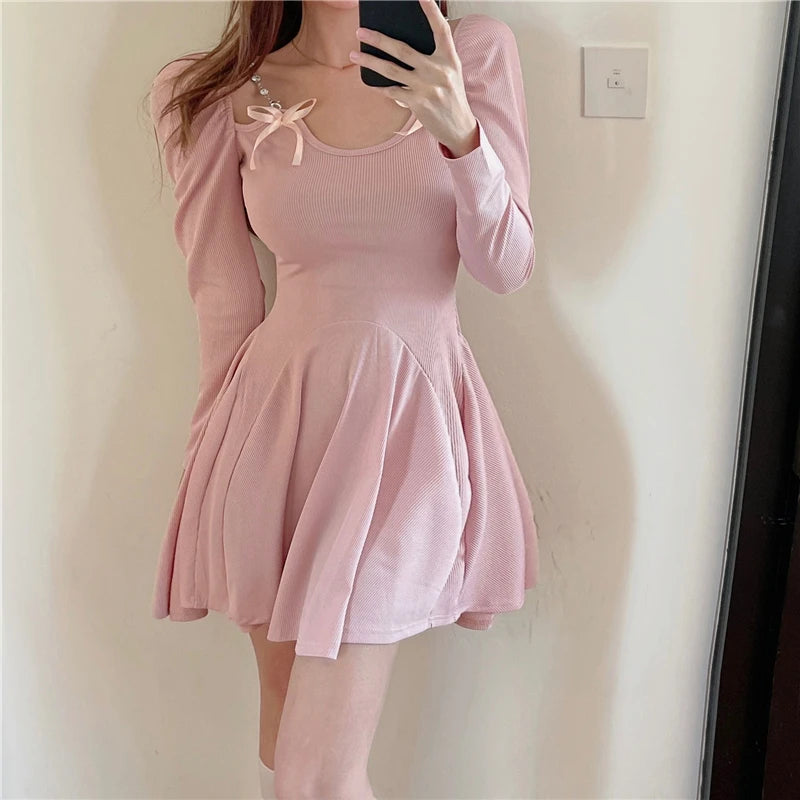 Elegant Long Sleeved Midi Dress With Bow Details