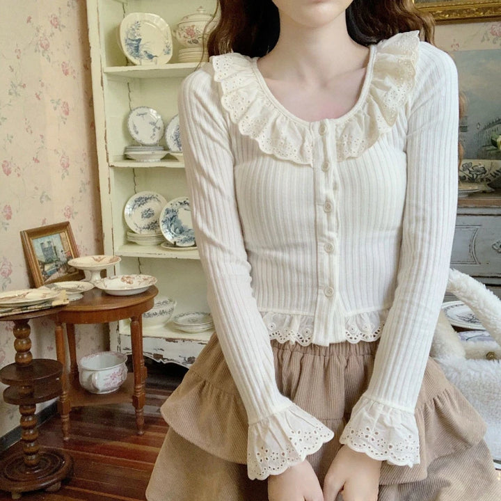 Longsleeved Blouse With Ruffled Neck And Hem