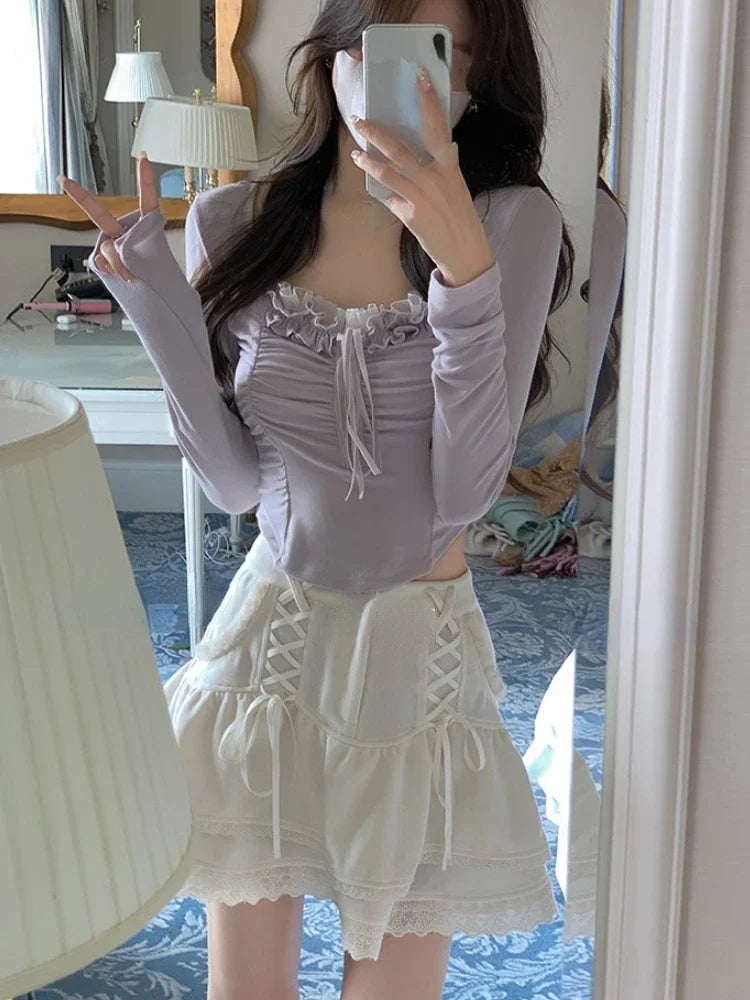 Cute Cropped Top With Long Sleeves And Lace Applications