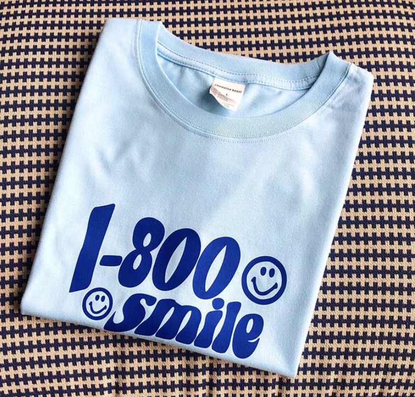 "1-800 Smile" T-Shirt With Smiley Print