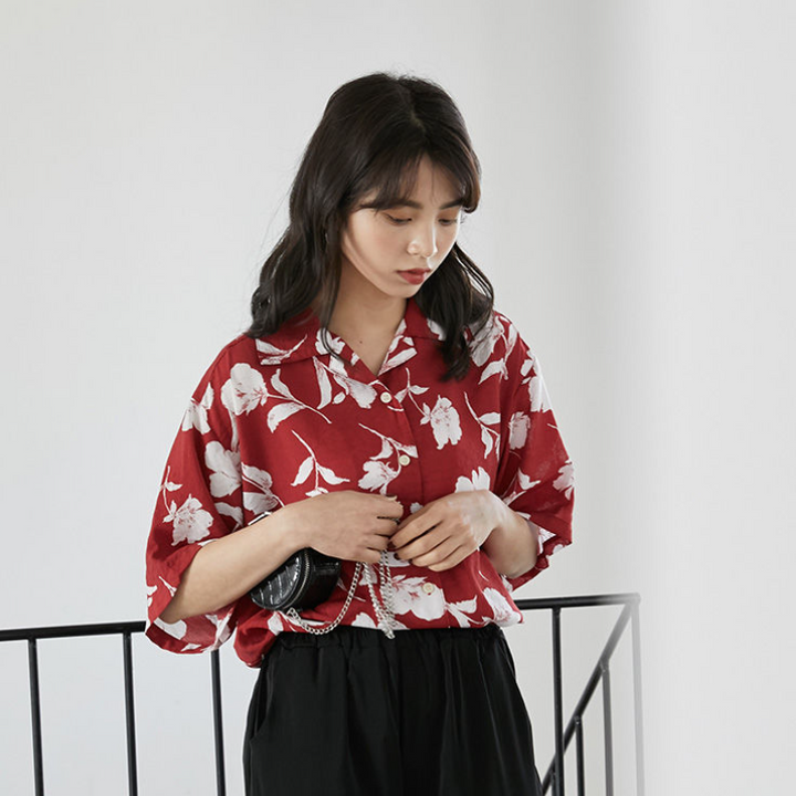 Shortsleeved Blouse With Floral Pattern