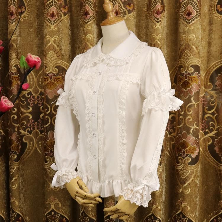 Blouse With Lace Details And Detachable Sleeves