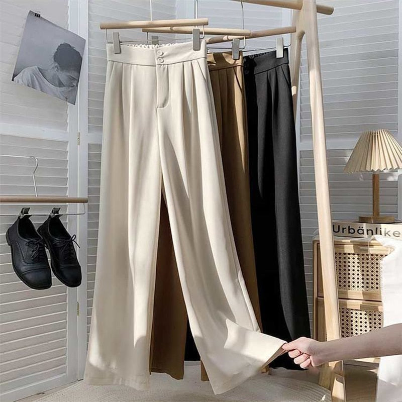 Pants With Pleated Details And Straight Cut