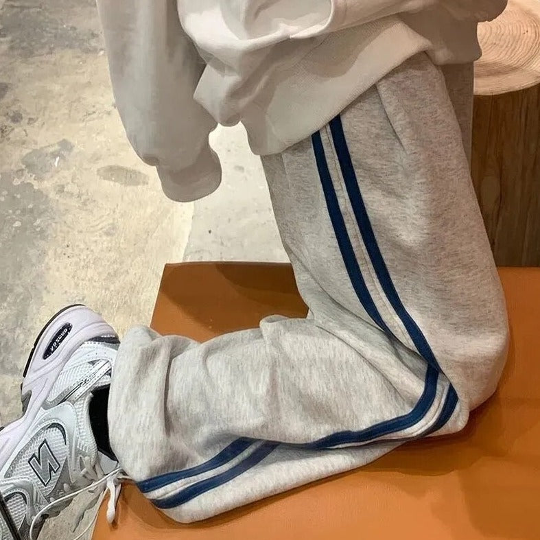 Sweatpants With Drawstrings And Stripes